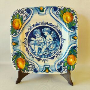 Piatti ceramica o porcellana decorati a mano